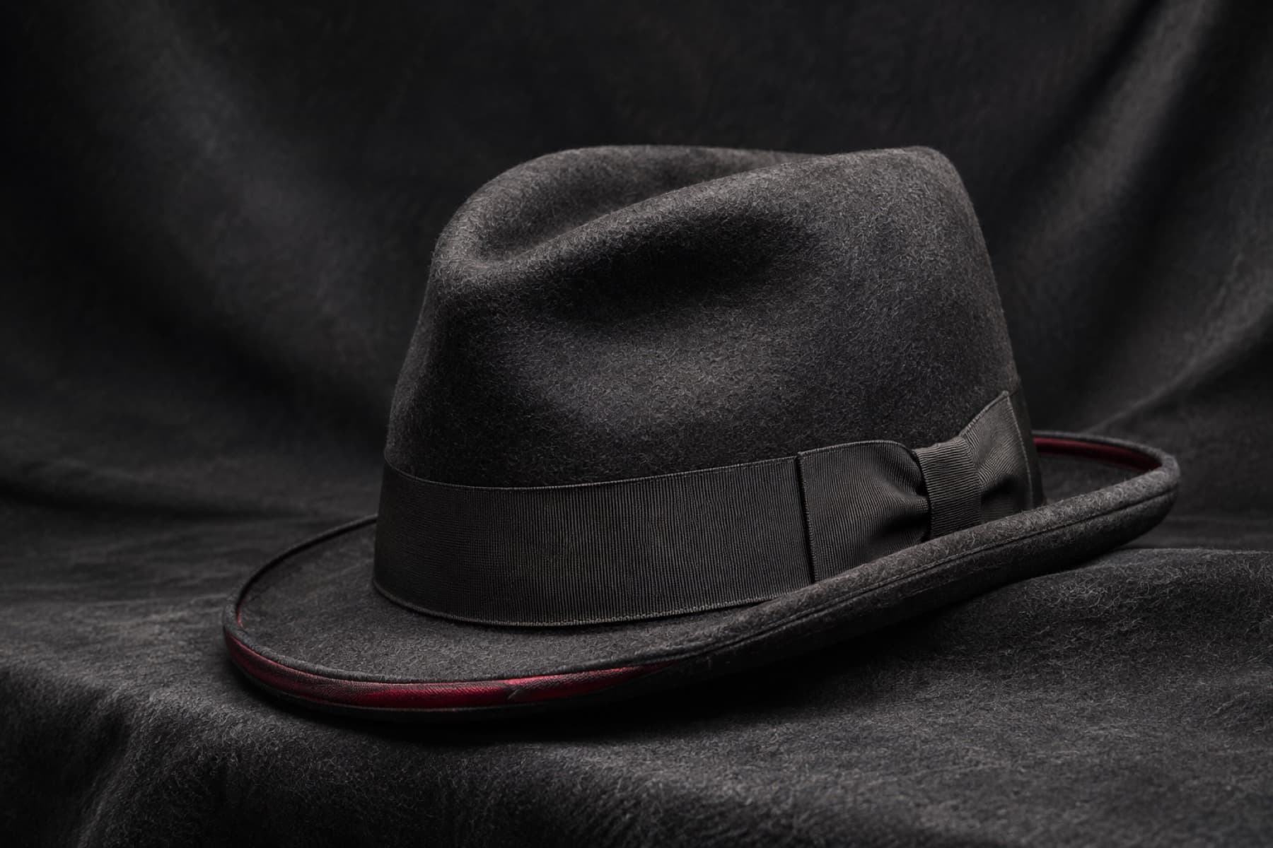 Homburg Wool: charcoal felt hat photographed whole under a single hard side light